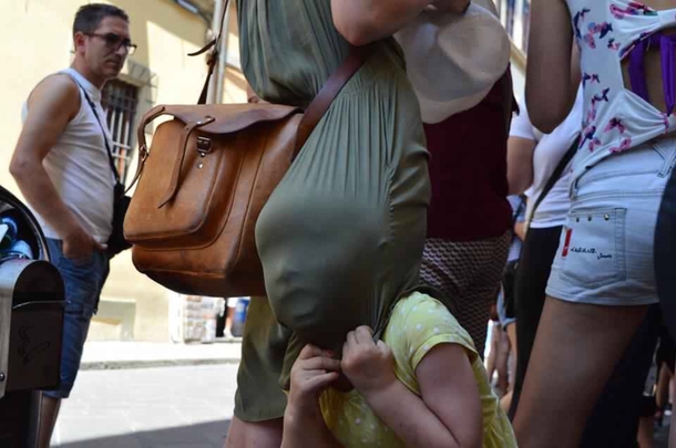 Bored child waiting in line