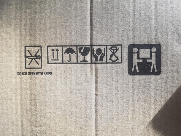 Box only to be carried with two penises