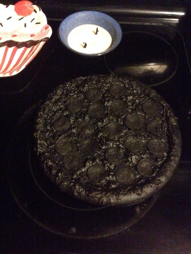 Boyfriend put a pizza in the oven and fell asleep this was the result
