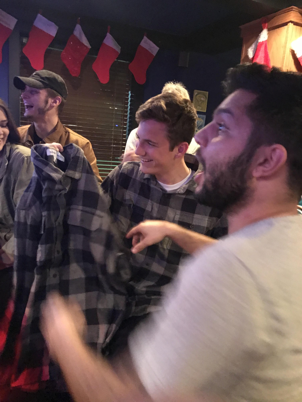 Buddy at work secret Santa party legit just got gifted the same shirt he is wearing