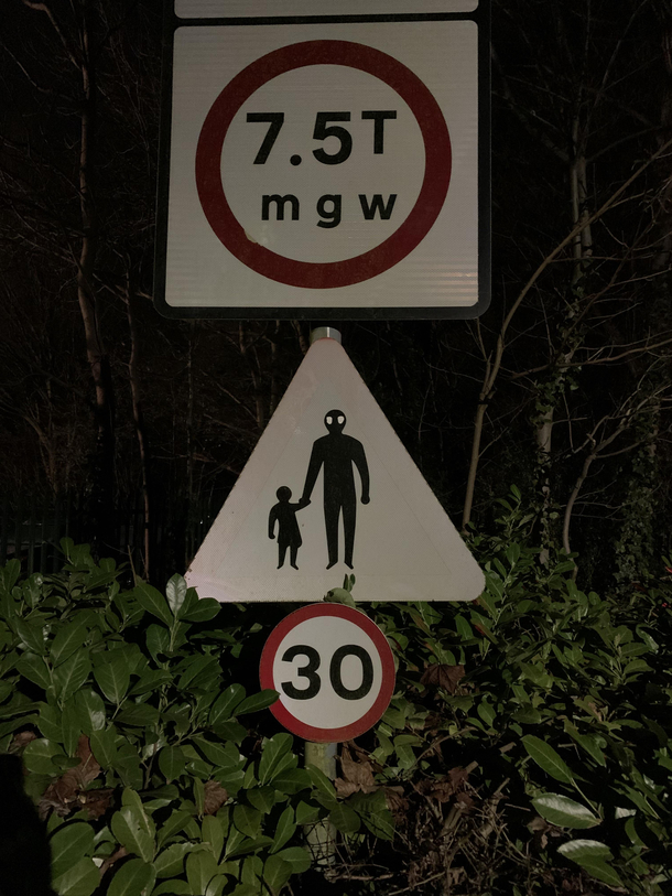 CAUTION Aliens kidnapping children ahead