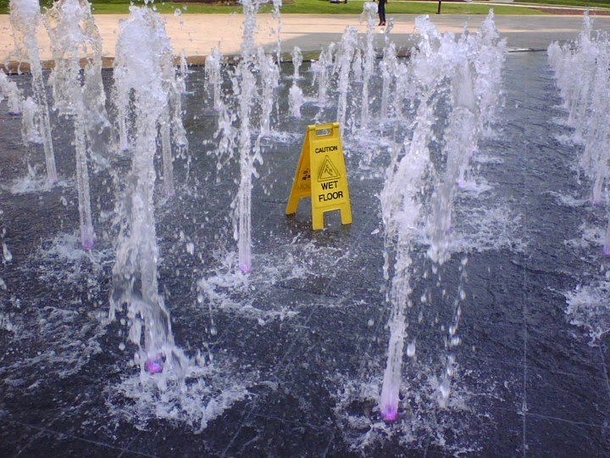 CAUTION Wet Floor