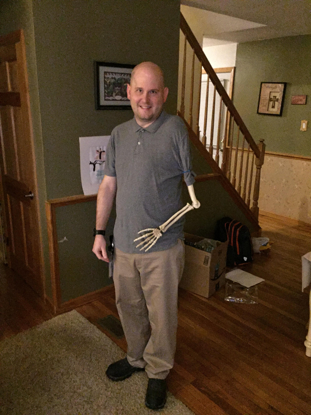 Confusing trick-or-treaters with a posable skeleton arm for the last  years