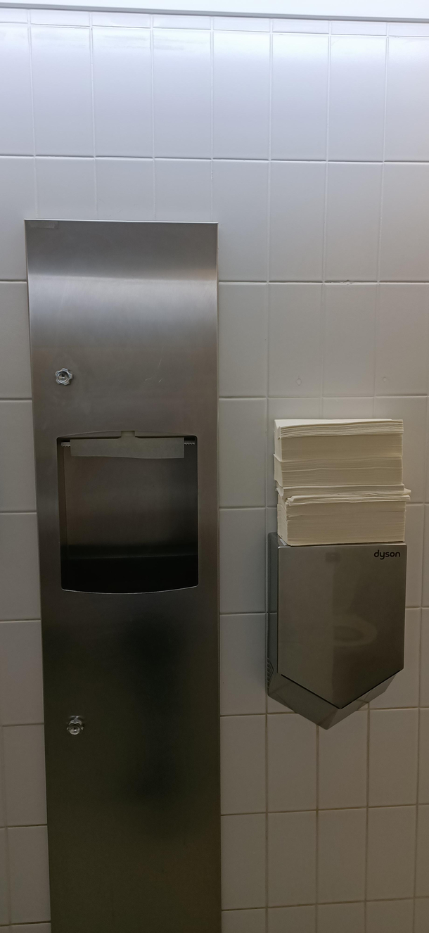 Corporate installed this in the bathroom but its too loud and now it acts as a shelf for its predecessor