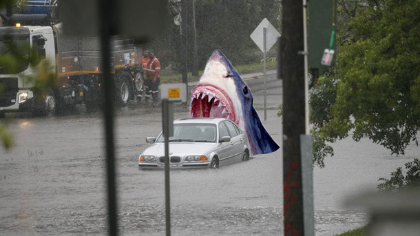 Could be photoshopped but it sums up yesterdays storm in Sydney