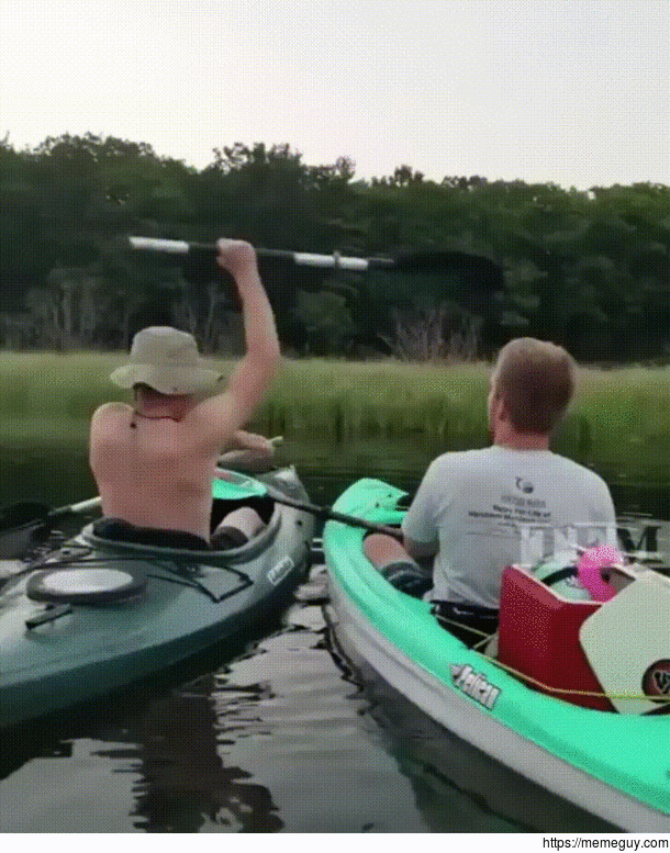 Cracking open a beer with a paddle