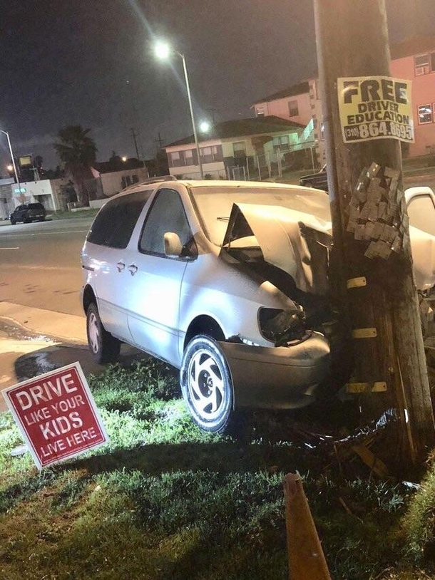 Crashing next to these two signs