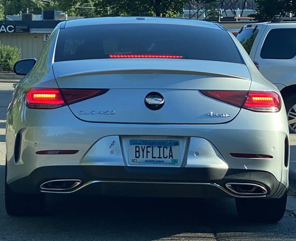 Cut me off then hit me with the vanity plate sass