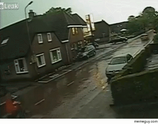 Cyclist hit by car in the rain