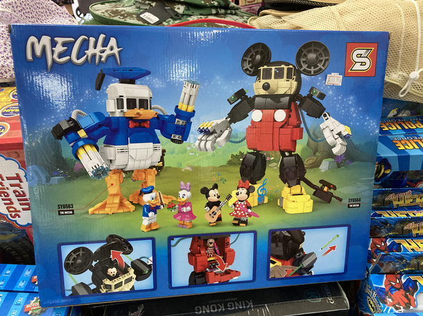Daffy Duck Lego knockoff with mini guns as hands