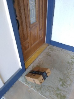 Delivery driver took my package delivered picture midway through tossing my package on the ground