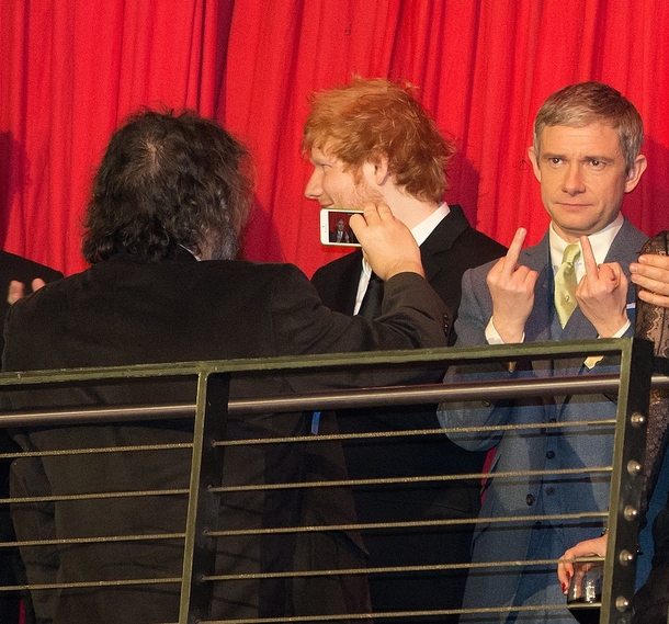 Director Peter Jackson takes a photo of Martin Freeman Bilbo at The Hobbit premiere