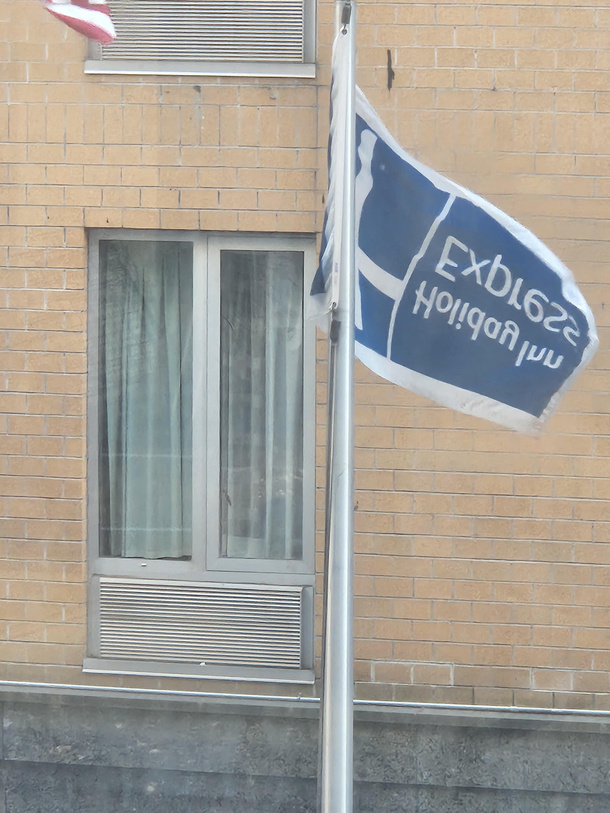 Does flying their flag upside down mean that Holiday Inn is in distress