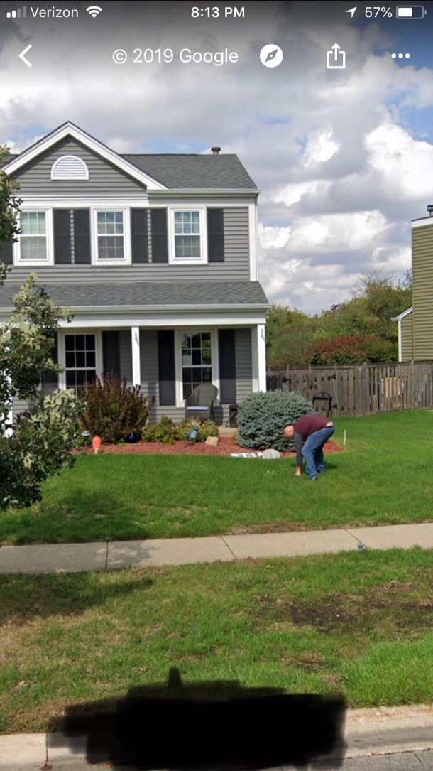 Doing yard work outside my home completely oblivious to the Google street-view camera car rolling by and exposing my crack to the world