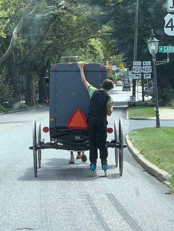 Driving home today and saw this Amish boy on roller blades No thats not a helmet