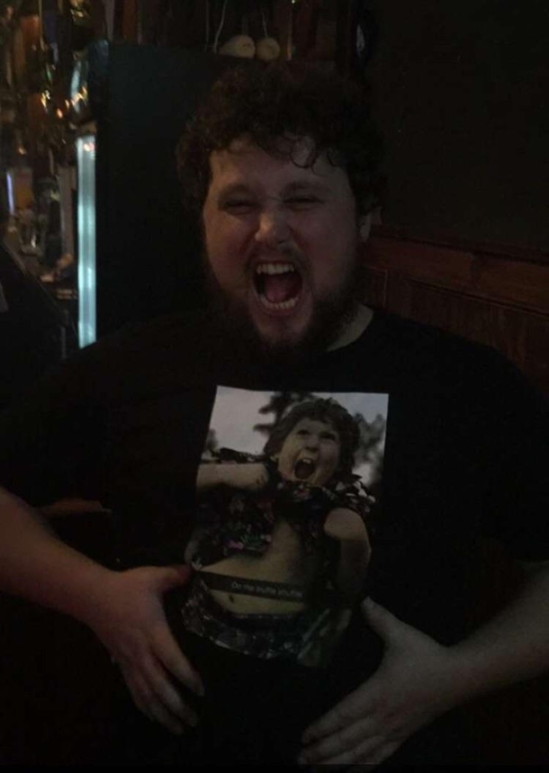 Drunk girl at the bar asked my friend if the picture on his shirt was him as a kid