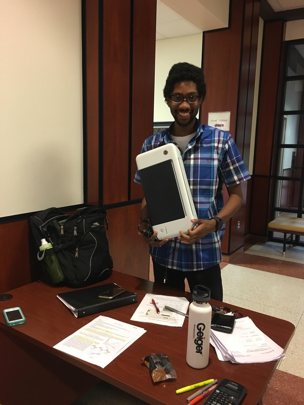 Dude pulled pulled a printer out of his backpack so he didnt have to pay to use the universitys print station