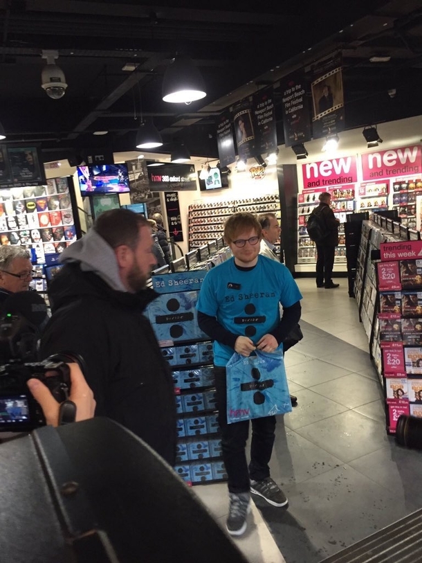 Ed Sheeran looks like hes queuing up to meet Ed Sheeran