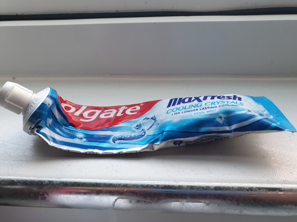 Either my wife or yr old keeps squeezing the toothpaste in the middle  despite my objections In retaliation until they stop everytime I brush my  teeth I will be squeezing the toothpaste