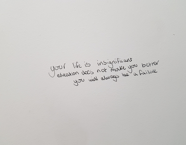 Encouraging words of motivation on a toilet wall in my university