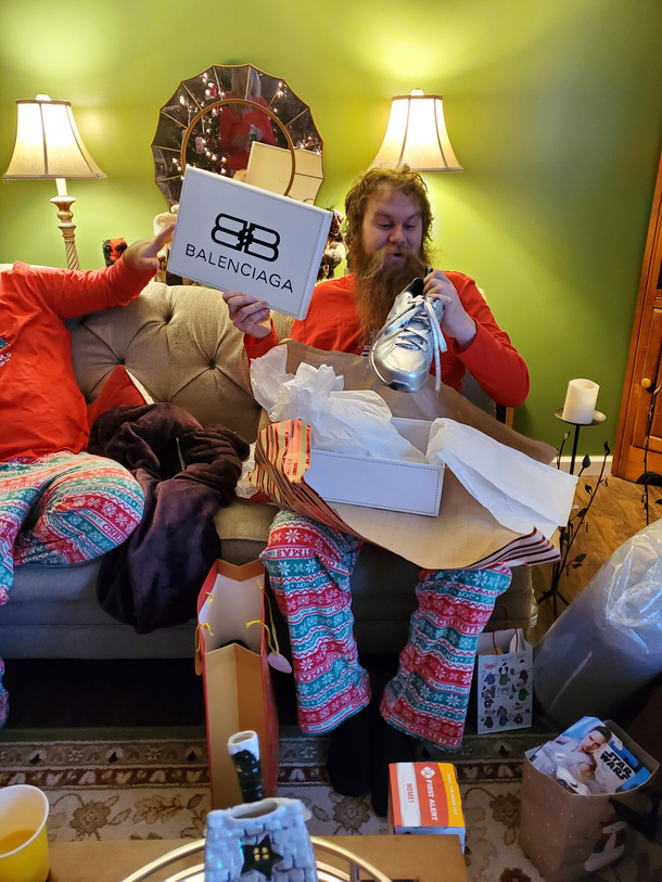 Every year my husband adds one outrageous gift to his Christmas list This year was a k pair of metallic sneakers My mom delivered with these customized New Balance-iagas He loves them