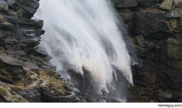Extreme winds cause a waterfall in to blow upward