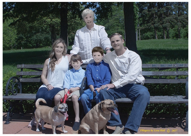 Family pays  for professional photosphotographer doesnt know how to handle bright sunny day so they decide to DRAW their faces on