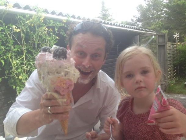 Father and daughter getting ice cream