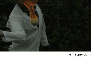 Flaming tennis ball in slow motion
