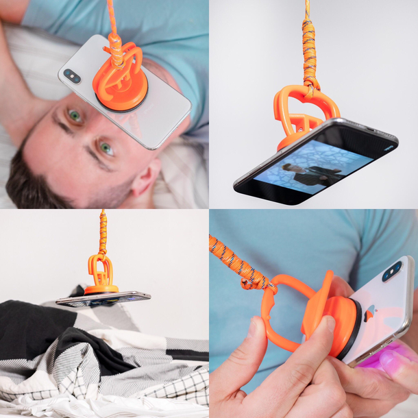 For fun I design fake products that solve problems in an unnecessary way The iDangle is the hands free way to watch your phone inches from your face in bed