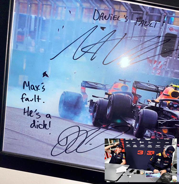 Formula  drivers Max Verstappen and Daniel Ricciardo sign a picture of their infamous  collision