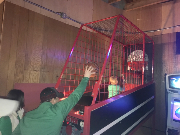 Found this dad using his son to break the high score in arcade basketball at a bar