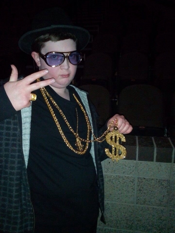 Found this kid on my newsfeed Regardless of the context of this photo I chose to believe he is an actual unstoppable Pimp Lord
