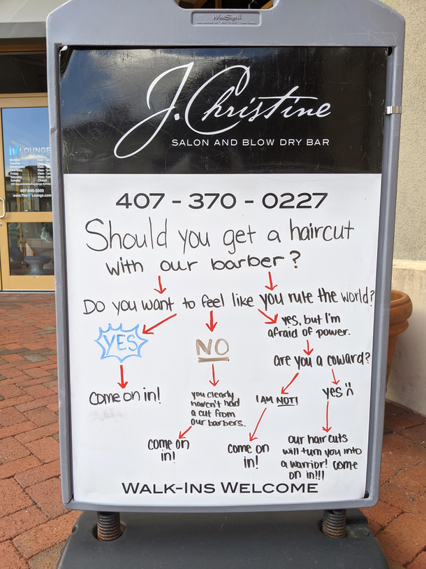 Found this sign in front of a barber shop