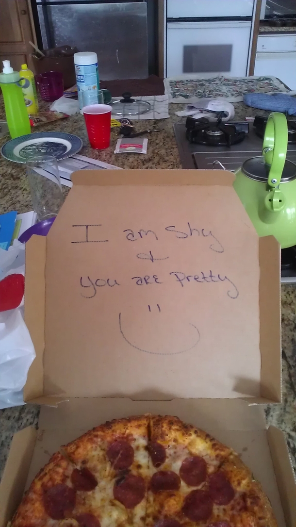Friend was offended when the delivery driver didnt say anything as he dropped off the pizza Opened the box and quickly felt guilty