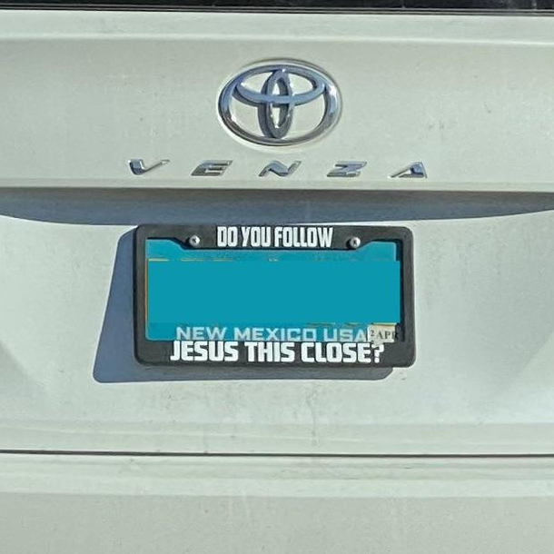 Funny license plate surround in Albuquerque