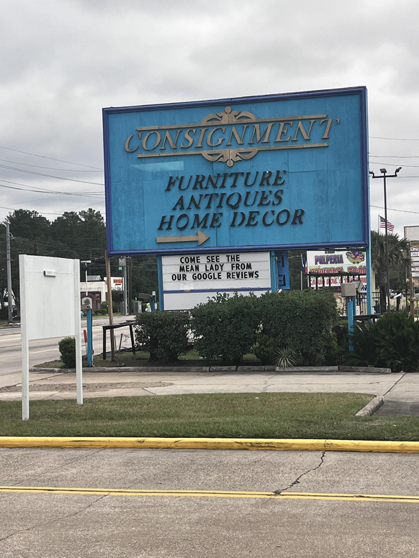 Funny sign at an antique store I would go just because of it