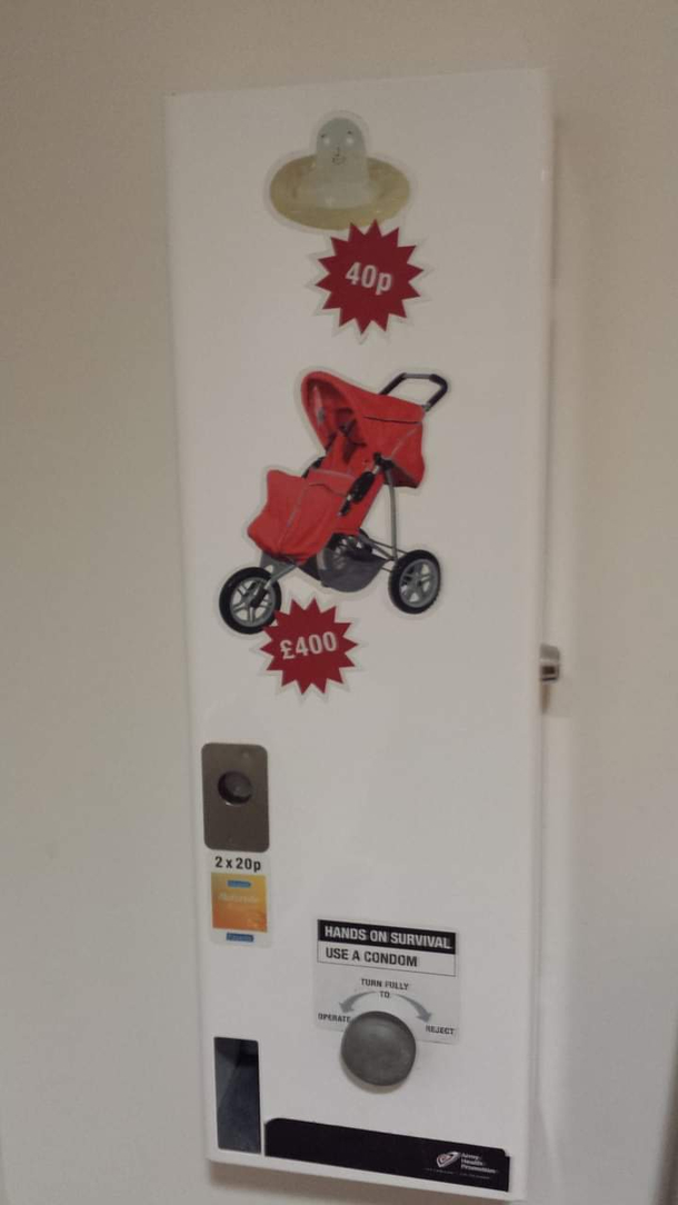funny sign on a condom machine