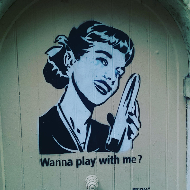 Funny street art on a door