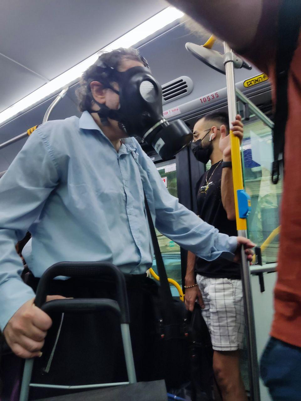 Gas mask on a bus cant be too careful