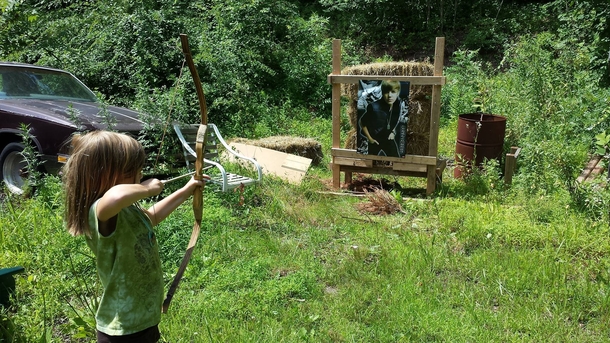 Girl celebrated her th birthday with two gifts a bow and arrow set and a poster of Justin Bieber x-post from rpics