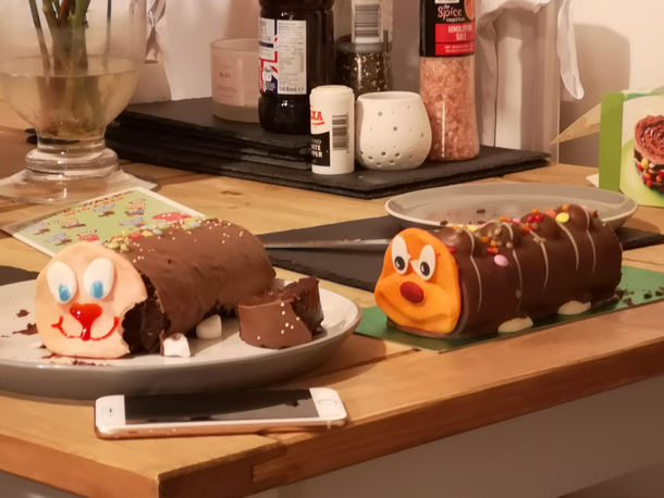 Girlfriend tried to make me a caterpillar cake for my birthday Ended up buying one after making the first because she couldnt remember if she used flour or not