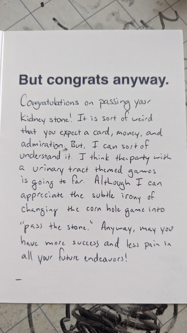 Giving a graduation card to my neighbors kid