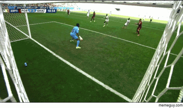 Goalkeeper reacts to blocking a header from the World Player of the Year Cristiano Ronaldo