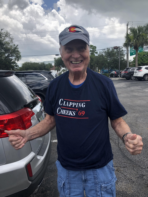 Grandpa wearing his new Goodwill shirt with pride