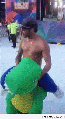 Guy riding a dancing dinosaur