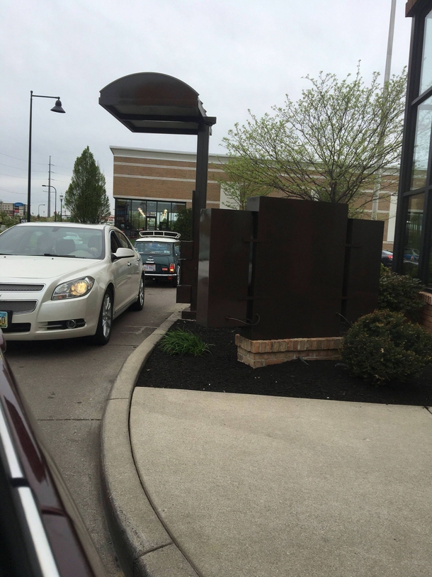 Guy was driving a right side steering car so he drove in reverse through the drivethru
