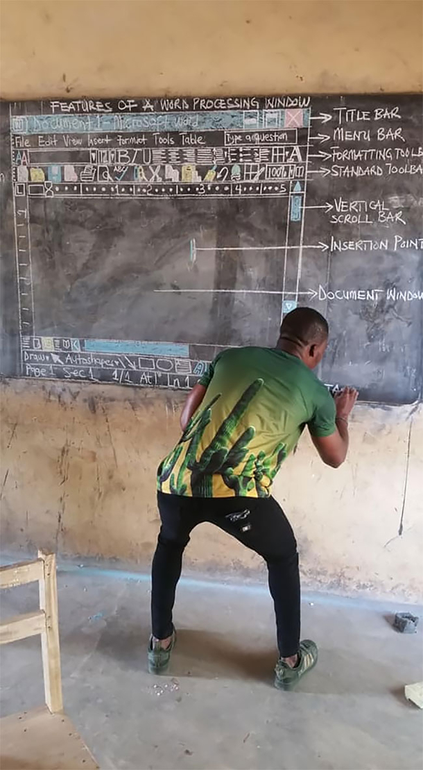 Having no computer this teacher from Ghana teaches Word on a backboard