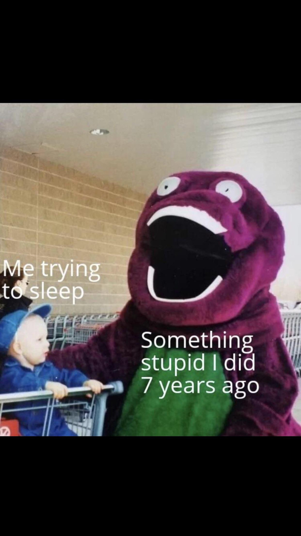 He looms in the shadows
