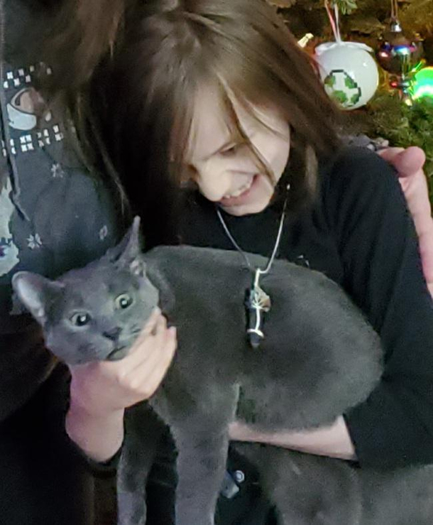 He wanted the cat to be in the family pic